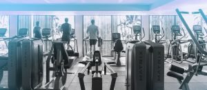 3 people walking or running on Matrix treadmills